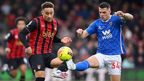 Marcus Tavernier of AFC Bournemouth battles for possession with Granit Xhaka of Sunderland
