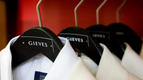 Gieves & Hawkes jackets on hangers