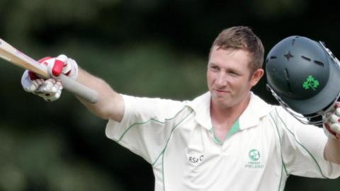 Andrew White celebrates scoring a century against Canada in 2008