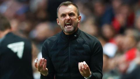 Nathan Jones gesturing on the touchline