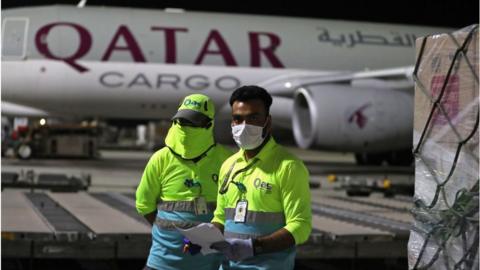 Supplies to tackle the coronavirus pandemic are loaded onto a Qatar Airways flight.