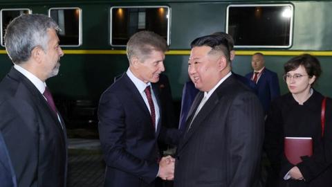 North Korean leader Kim Jong Un is welcomed by governor of Russia's Primorsky Region Oleg Kozhemyako upon arrival in Khasan, Russia, September 12, 2023,