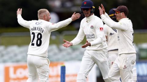 Matt Parkinson celebrates with Keaton Jennings