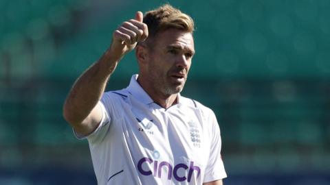 England bowler James Anderson gives a thumbs up after reaching 700 Test wicket