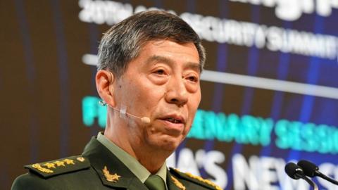China's Minister of National Defence Li Shangfu delivers a speech during the 20th Shangri-La Dialogue summit in Singapore on June 4, 2023