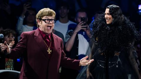 Elton John and Dua Lipa on stage at London's Royal Albert Hall