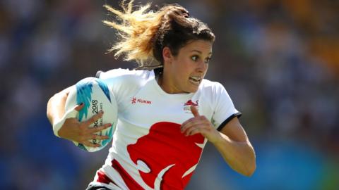 England's Abigail Brown runs with the ball