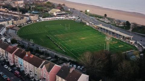 An aerial view of St Helen's with beach and sea in the background
