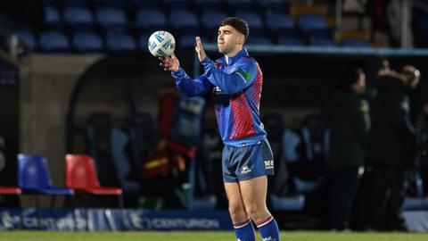 Jack Sinfield of Wakefield Trinity participates in the pre-game warm-up
