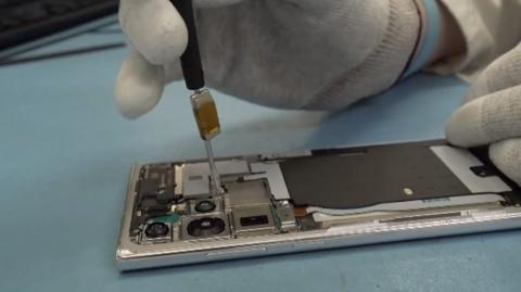 A mobile phone being repaired.