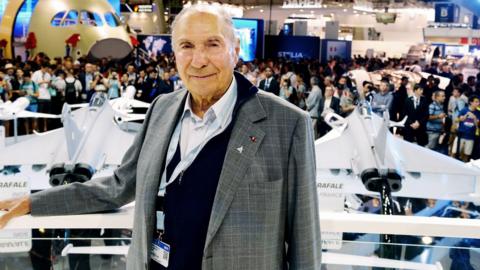 In this file photo, chairperson of the Dassault Group and senator Serge Dassault poses at the Dassault Aviation stand during the International Paris Air Show in Le Bourget on 23 June 2017.