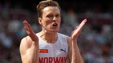 Karsten Warholm warming up