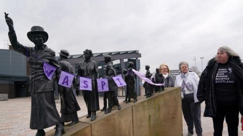 Statue showing WASPI campaigners