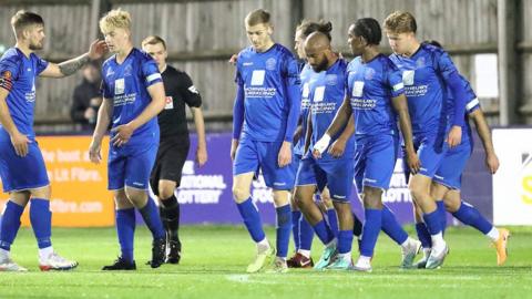 Chippenham Town players on the pitch together