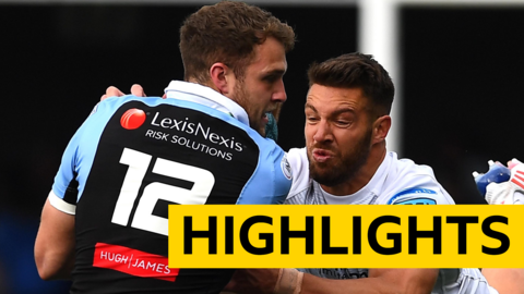 Max Llewellyn of Cardiff is tackled by Rhys Webb