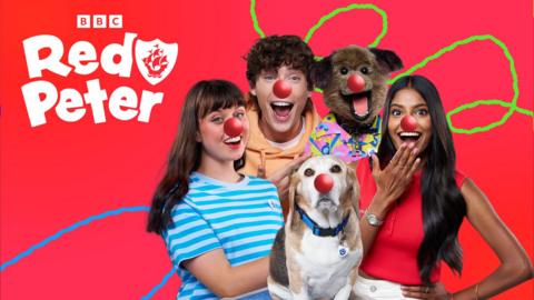 Blue Peter presenters and Henry the dog. From left to right, Abby, Joel, Hacker (A puppet dog), Shini and Henry a beagle-bassethound real dog.