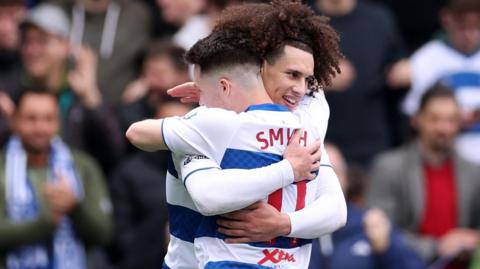 Paul Smyth congratulates QPR team-mate Rahan Kolli for scoring his fifth goal of the season