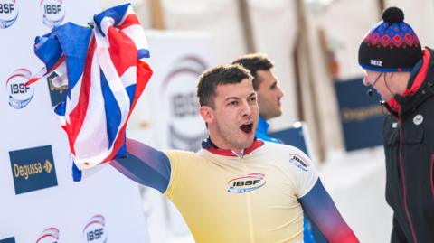 Britain's Matt Weston celebrates World Cup and European gold in Switzerland.