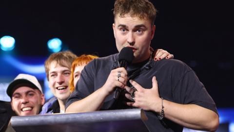 Sam Fender on stage accepting the Mercury Music Prize