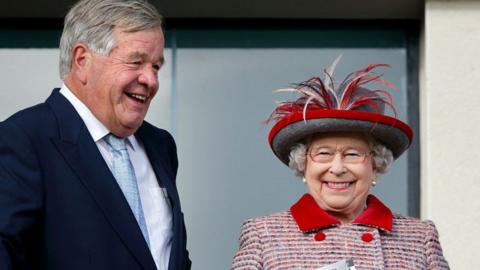 Sir Michael Stoute with the late Queen Elizabeth II