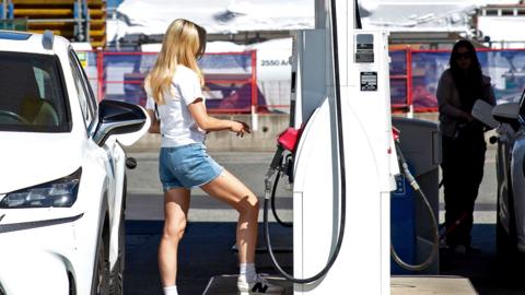 A driver refuels at a Shell gas station in Vancouver, British Columbia, Canada, on Monday, May 4, 2026.