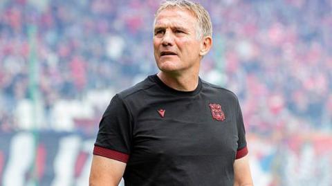 Wrexham manager Phil Parkinson on the touchline in Poland last weekend 