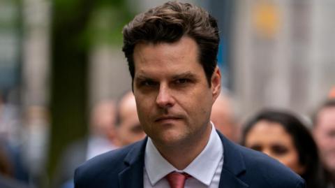 A close-up of Matt Gaetz outside a court building