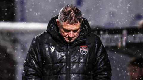 Tony Docherty looks dejected