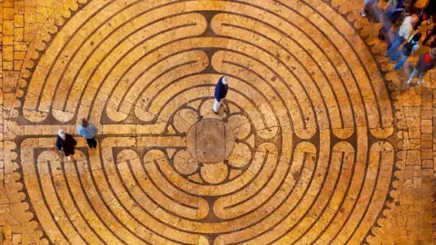 Aerial view of people doing labyrinth walking