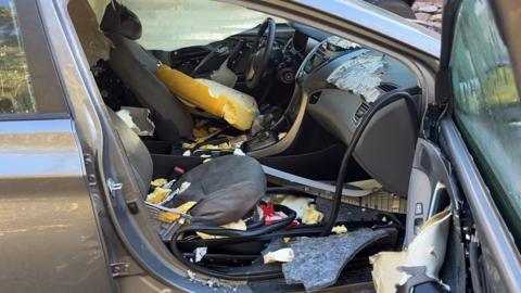 Interior of a vehicle destroyed by a bear