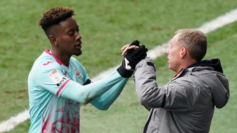 Jamal Lowe is congratulated by Swansea boss Steve Cooper