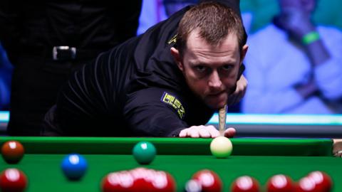 Mark Allen lines up a shot at the British Open