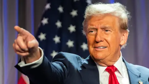 US President-elect Donald Trump gestures during a meeting with House Republicans at the Hyatt Regency hotel in Washington, DC, USA, 13 November 2024.