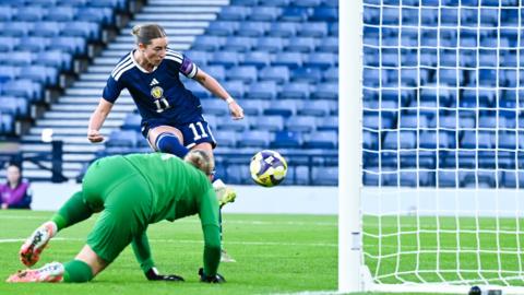 Scotland's Kathleen McGovern scores