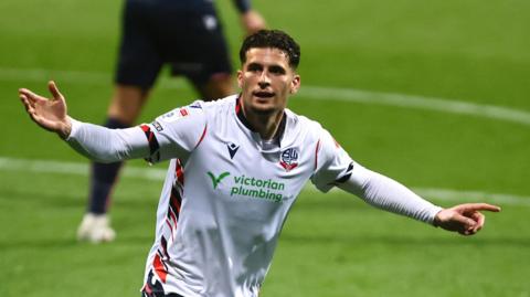 Ruben Rodrigues celebrates scoring Bolton's fourth goal against Stevenage