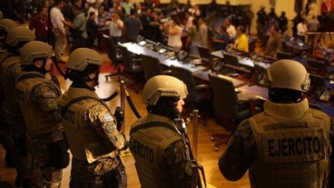 Armed soldiers stand inside parliament in El Salvador's capital San Salvador. Photo: 9 February 2020