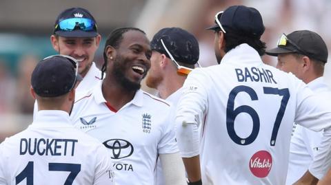 England players celebrate a wicket