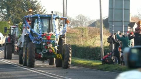 A tractor wrapped in tinsel 