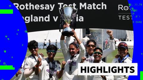 The India women's team lifting the trophy 