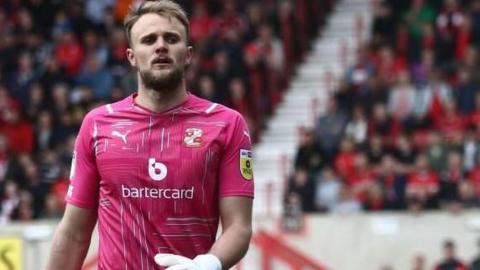 Lewis Ward in action for Exeter City