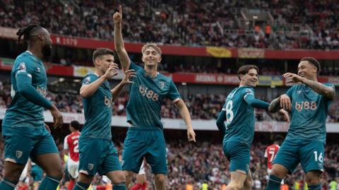 Bournemouth players celebrate a goal at Arsenal in 2025