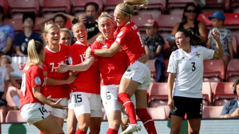 Austria celebrate Katharin Schiechtl's goal