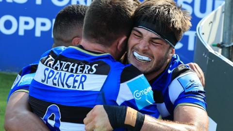 Josh Bayliss celebrates his try