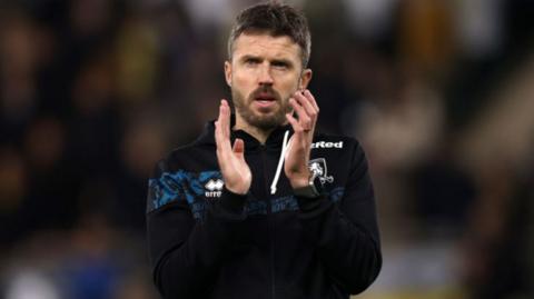 Middlesbrough manager Michael Carrick applauds Boro fans