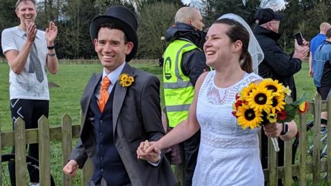 Simon Wright and Anna Thorpe in wedding outfits