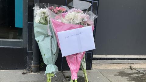 Floral tributes have been left near the scene of the fatal crash, with a note which read: "Rest easy angel"