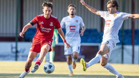 Connah's Quay Nomads' Callum West in action against Ballkani
