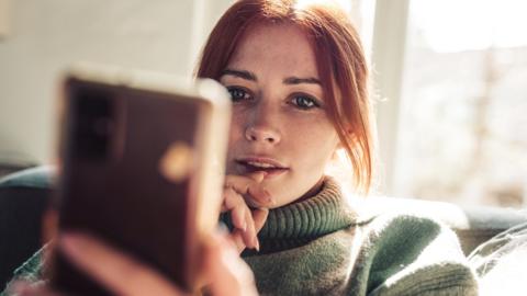 Woman looking at phone