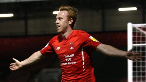 Leyton Orient's Danny Johnson celebrates after scoring a 93rd minute winner against Plymouth in the Carabao Cup to set up a third round tie with Tottenham