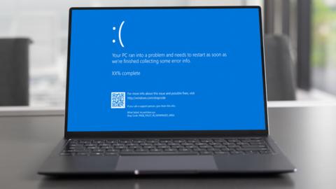 Stock image composite of the blue screen on a laptop